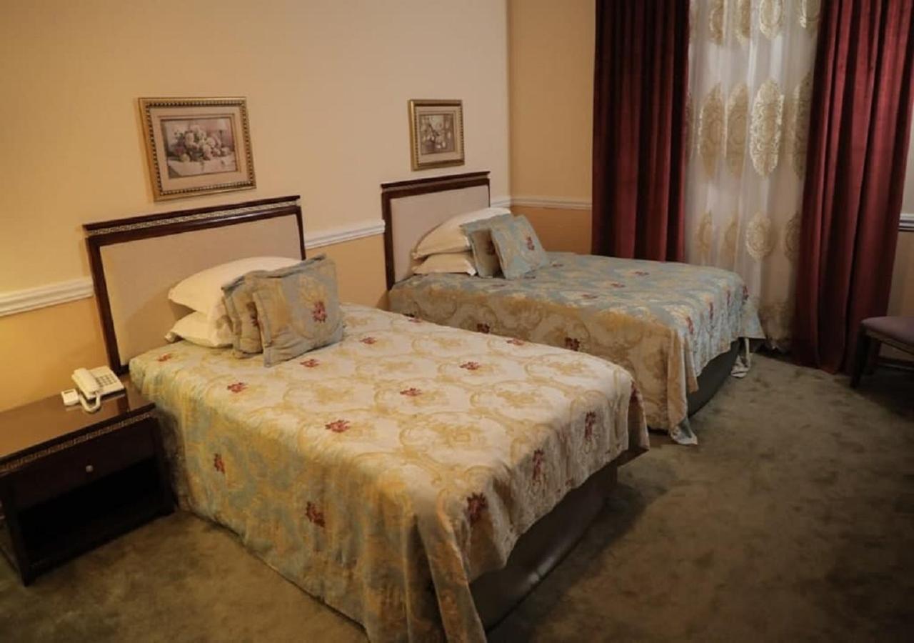 Hotel BEK Tasjkent Buitenkant foto