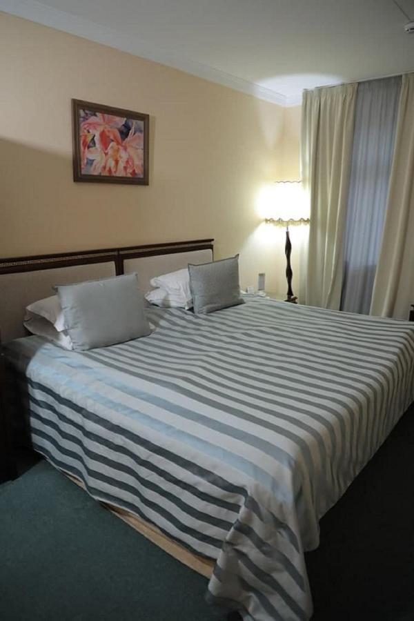 Hotel BEK Tasjkent Buitenkant foto